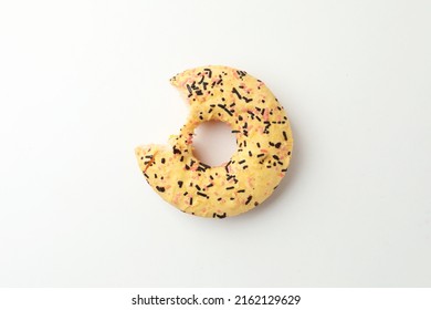 Delicious Yellow Glazed Donut With Bite Mark On White Background, Top View