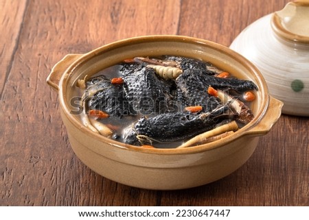 Delicoius silky chicken, black-boned chicken soup with Chinese herbal medicine.