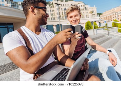 Delighted Foreign Student Holding Coffee