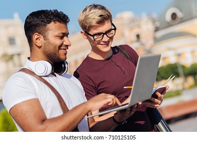 Delighted Foreign Student Standing Near His Friend