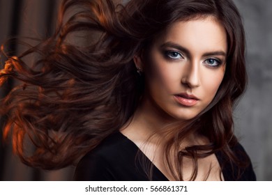 Delightful Portrait Of A Woman Brunettes, Hair Flying On The Wind, Sloppy Styling