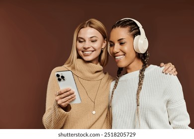 A delightful young couple laughs and shares music while dressed warmly for autumn. - Powered by Shutterstock