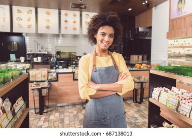 Delightful Young Woman Is Working In Health Food Store