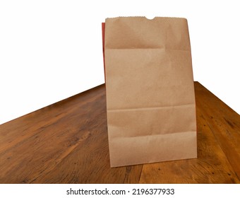 Delivery Bag On Wooden Table. White Background.