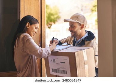 Delivery, box and package for signature and paperwork, distribution and parcel for logistics. Post officer, smile or shipping from male person, online shopping or woman customer for import shipment - Powered by Shutterstock