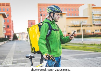 Delivery Boy With Bycicle Cross The City To Taking Food For The Next Order - Concept Of New Sustainable Transport And Logistics