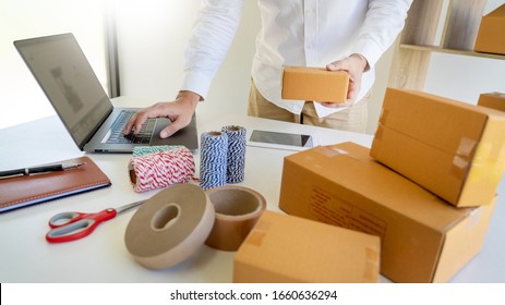 Delivery Business Small And Medium Enterprise(SMEs) Workers Packaging Box In Distribution Warehouse Home Office For Shipping To Client