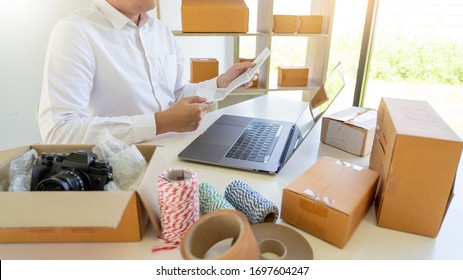 Delivery Business Small And Medium Enterprise(SMEs) Workers Packaging Box In Distribution Warehouse Home Office For Shipping To Client