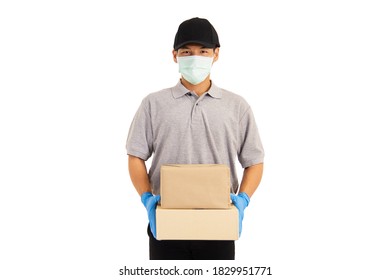 Delivery Driver Man In Uniform With Surgical Mask Hold Boxes In His Hand Isolated On White Background