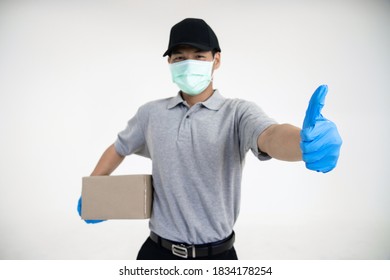 Delivery Driver Man In Uniform With Surgical Mask