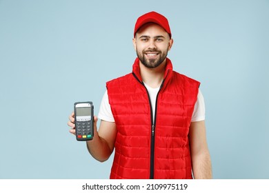 Delivery Employee Man In Red Cap White T-shirt Uniform Work As Dealer Courier Hold Bank Payment Terminal To Process And Acquire Credit Card Payments Isolated On Blue Color Background. Service Concept