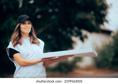 Delivery Girl Holding A Large Box Of Pizza. Fast Food Worker Making A Drop Off On An Online Order
