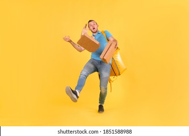 Delivery Guy In Blue Uniform Slipped And Lost His Balance And Threw Boxes Of Food From Restaurant In Direction. Clumsy Food Delivery Guy Broke Up An Order For Customer. Poor Product Delivery