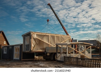 Delivery And Installation Of A Modular Frame House. Frame Construction Of Small Houses. Modular Housing Construction. Your House. An Inexpensive House.