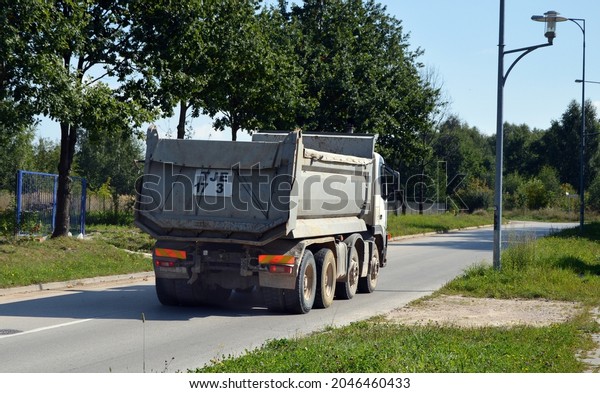 Delivery large tipper\
truck on the road