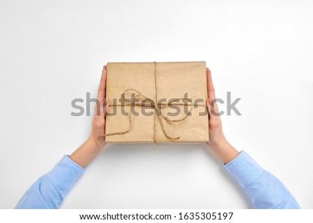 Similar – Image, Stock Photo Top view of female using her laptop on a wooden table.