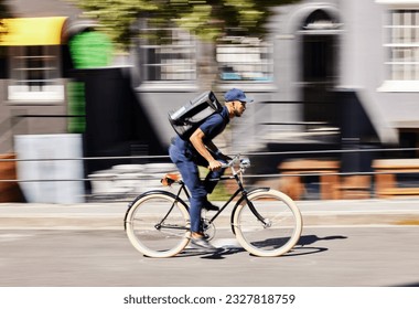 Delivery man, bicycle and motion blur in city for fast logistics, quick distribution service and order. Courier, guy or travel with speed on bike, cycle and transportation for package in urban street - Shutterstock ID 2327818759