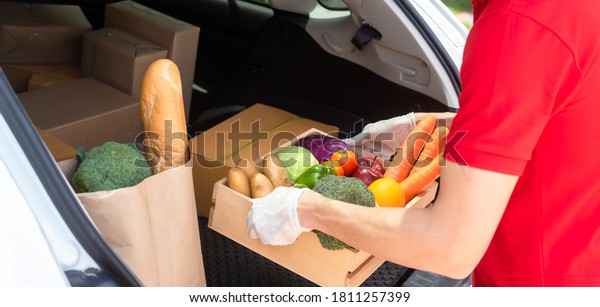 Delivery man bring food to\
customer