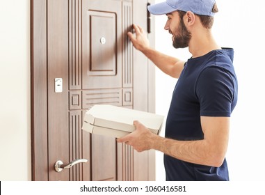 Delivery Man Cardboard Pizza Boxes Near Foto de stock 1060416581