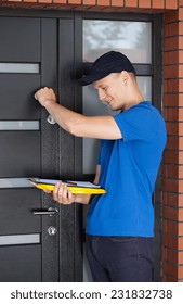 Delivery Man With Clipboard Knocking On Door