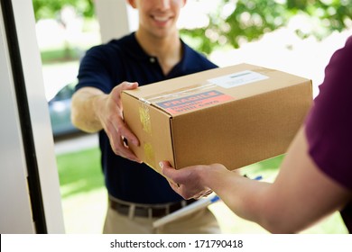 Delivery: Man Delivering Package To Homeowner