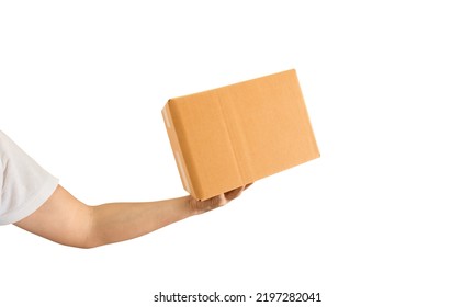 Delivery Man Hand Holding Parcel Cardboard Box Isolated On White Background. Online Shopping And Delivery Transport 