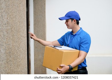 Delivery Man Hand Ringing Doorbell.