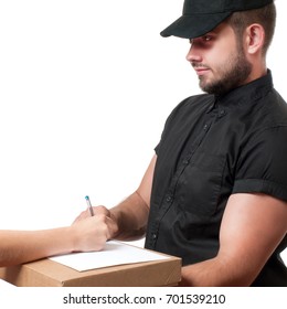 Delivery man holding a parcel while woman putting signature in clipboar.  Courier service concept