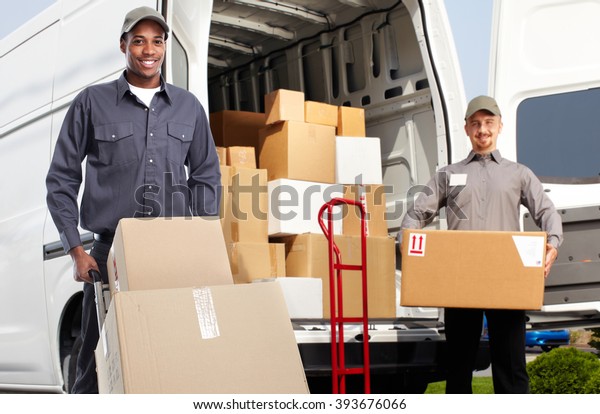 Delivery man near shipping
truck.