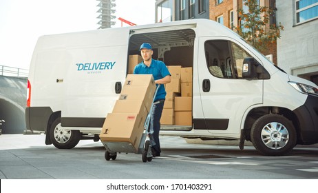 Delivery Man Pushes Hand Truck Trolley Full of Cardboard Boxes Hands Package to a Customer. Courier Delivers Parcel to Man in Business District.