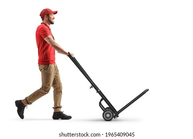 Delivery Man Pushing An Empty Hand Truck Isolated On White Background