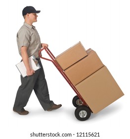 Delivery man pushing hand truck with boxes, isolated on a white background with clipping path