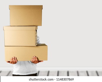 Delivery man stacked boxes