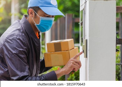 Delivery Man Wear Hygienic Mask And Blue Cap Pushing Bell And Holding Cardboard Box At Front Of Home Of Customer,light Leak Style