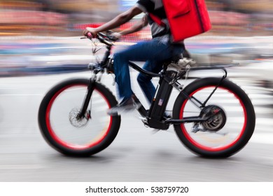 Delivery On The Bike In Traffic On The City Roadway Motion Blur