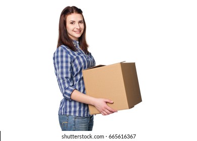 Delivery, relocation and unpacking. Smiling young woman holding cardboard box isolated on white background