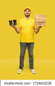 Delivery Service, Fast Food And People Concept - Happy Man With Coffee And Disposable Paper Bag.