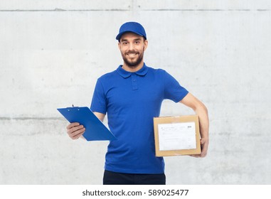 Delivery Service, Mail, Logistics, People And Shipping Concept - Happy Man With Parcel Box And Clipboard Over Gray Concrete Wall Background