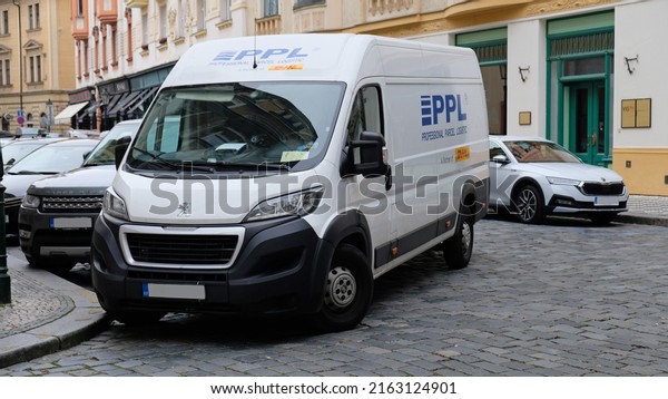 Delivery van of PPL company, partner of DHL\
postal service, parked when delivering parcels in downtown Prague -\
April, 2022. PPL CZ- Professional Parcel Logistic - courier\
delivery in Czech\
Republic.