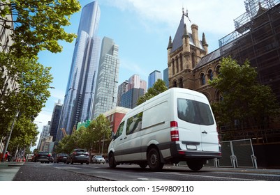 Delivery White Van In The City Street