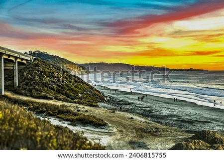 Delmar Beach San Diego CA with a fiery sunset.