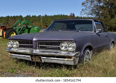 Delmar, DE/USA-Nov. 7, 2020:  Super Rare 1964 Pontiac LeMans Convertible, Left To The Elements In Rural Delaware.  This Muscle Car Preceded The GTO, And Is Said To Have Only 53 Of These Exist.