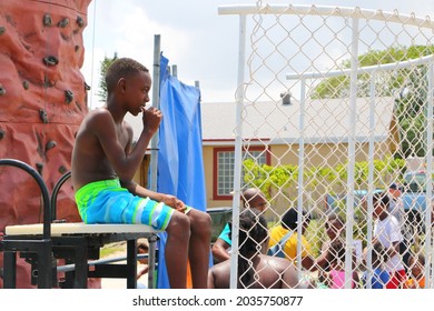 Delray Beach, Florida USA Aug 6 2016: The New Frog Alley Guns Down Kids Up Neighborhood Event On Sw 6th Ave Kids On Dunk Tank 