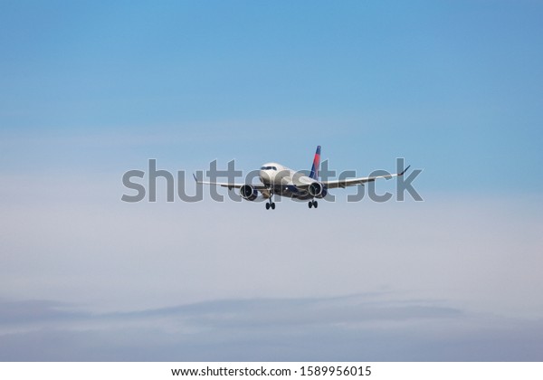 Delta Air Lines Airbus A220-100 aircraft with\
registration  N121DU landing at JFK International Airport in New\
York City. Delta Airlines is the largest carrier in the world.\
November 14, 2019- NY,\
USA