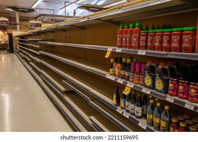 DELTA, CANADA - Jul 04, 2022: The Empty Grocery Store Shelves With Many Products Missing 