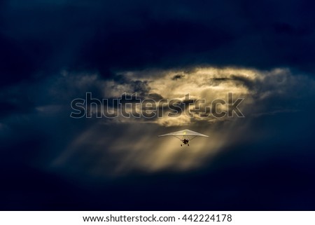 Similar – 700 X released to freedom|tree silhouette in foreground, red hot air balloon floating in evening sky