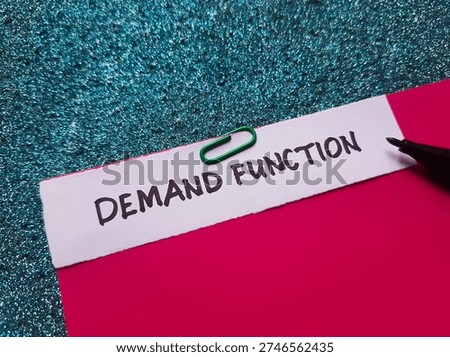 Demand function writting on blue background. 