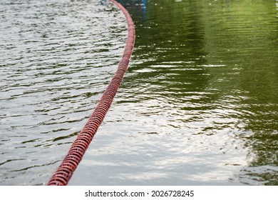 Demarcation for swimmers in the lake, buoyancy ropes, pool lanes. - Shutterstock ID 2026728245
