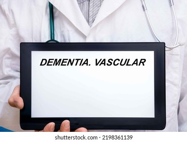 Dementia.  Doctor With Rare Or Orphan Disease Text On Tablet Screen Dementia