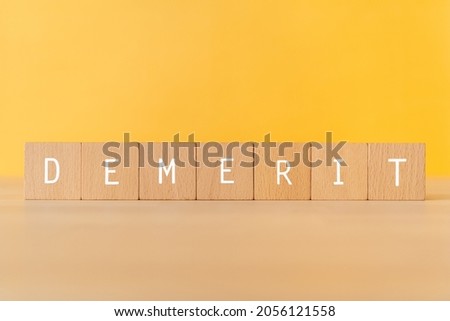 DEMERIT; Wooden blocks with 